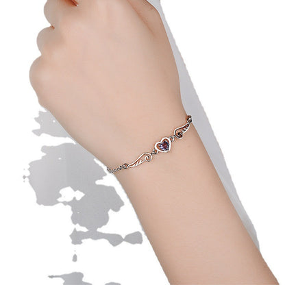 Hot new female plated 925 silver European and American fashion angel lover wings love bracelet